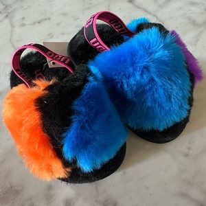 UGG baby girl/toddler fuzzy slippers NWT. Size 4/5.